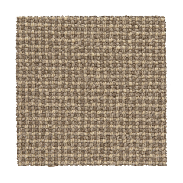A square swatch of Needlepoint III Berber Carpet in Coffee shows a textured, grid-like woven pattern in beige and brown tones on a white background—ideal for high-traffic areas.