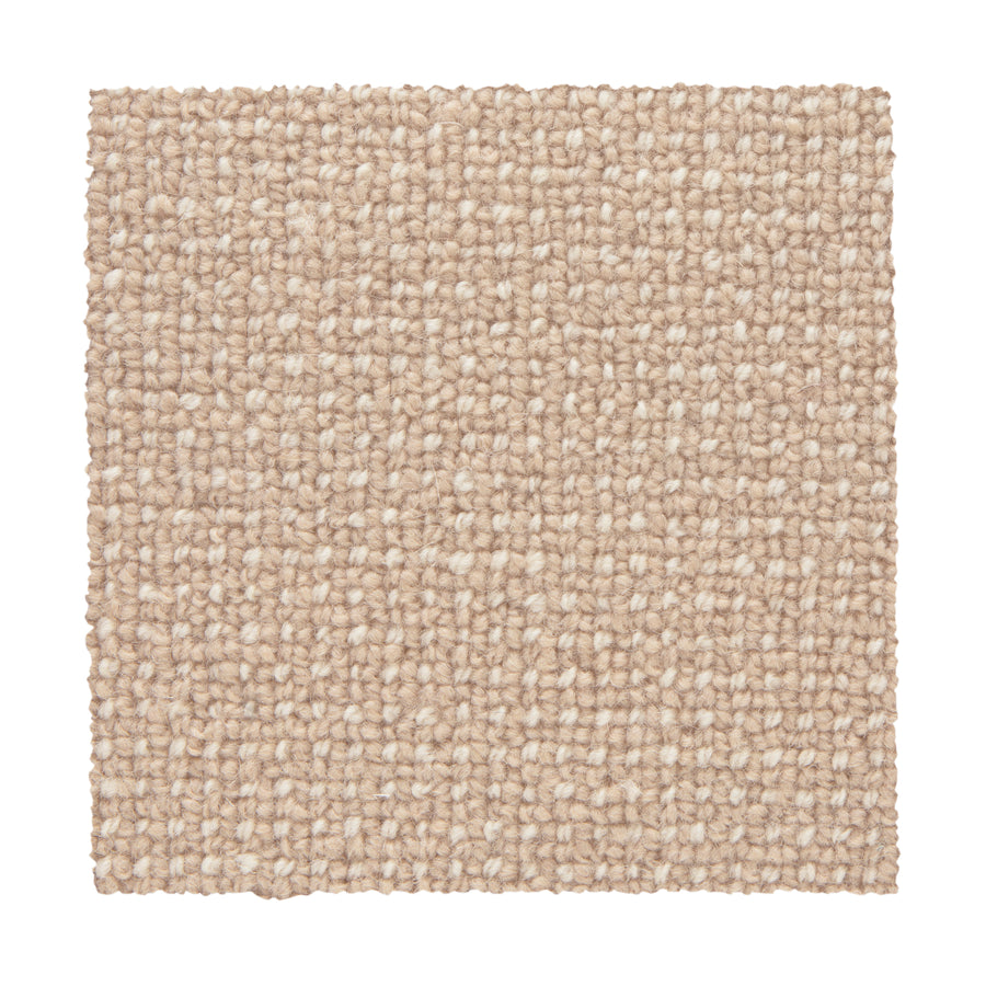 A square swatch of Needlepoint III Berber Carpet in Chamois shows its beige, looped pile texture against a white background. Tightly packed, even loops give it a soft, uniform look that's ideal for high-traffic areas.