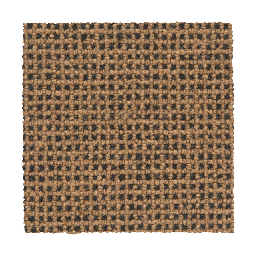 The Needlepoint III Berber Carpet in Poppyseed features a square swatch of woven fabric with a textured, checkered pattern—ideal for luxury carpet styles in high-traffic areas.