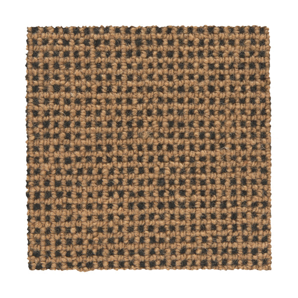 The Needlepoint III Berber Carpet in Poppyseed features a square swatch of woven fabric with a textured, checkered pattern—ideal for luxury carpet styles in high-traffic areas.