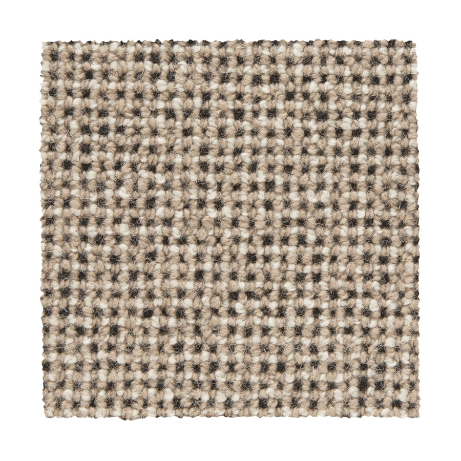 A square sample of Needlepoint III Berber Carpet in the color Ground, featuring a checkered beige, brown, and cream pattern with a looped texture ideal for high-traffic spaces.