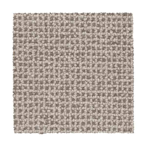 The Needlepoint III Berber Carpet swatch in Quartz features a tightly woven, looped pattern in light beige and gray. Ideal for high-traffic areas, the square sample is shown against a white background.