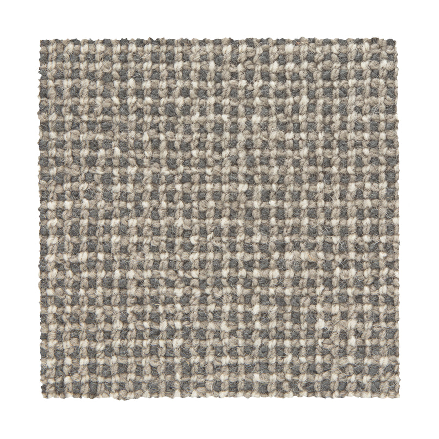A square swatch of Needlepoint III Berber Carpet in the color Temptation, featuring a textured checkered pattern with thick, raised threads—perfect for adding durable style to high-traffic spaces.