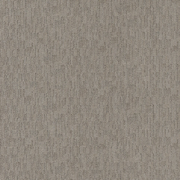 Close-up of Sneak Peak Berber Carpet in Nightingale color, featuring a textured, dense pile with a subtle linear pattern in brown and gray tones. Its soft, durable surface provides lasting comfort and style, resembling classic woven fabric.