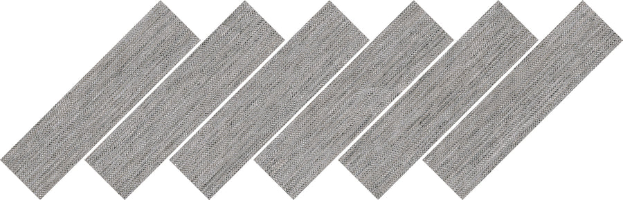 Six gray, rectangular tiles are arranged in a diagonal, overlapping pattern, creating a zigzag or chevron design. The tiles have a textured, stone-like surface.