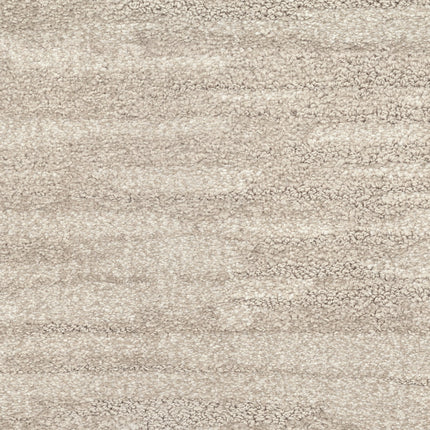 Cirrus Berber Carpet in Nimbus features a beige, textured luxury surface with a subtle wavy pattern and plush feel. Its shading variations create a premium, slightly mottled look for elegant flooring.