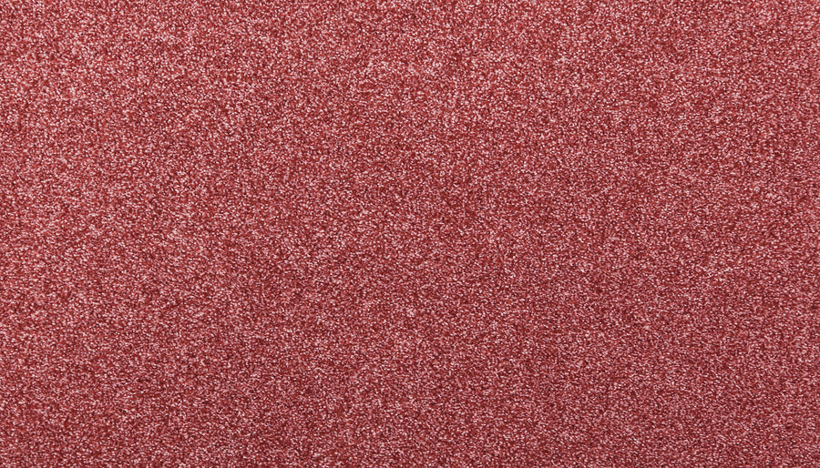 A close-up of the Noble Surface Pet Friendly Carpet in Desert Rose, showcasing its festive, glittery texture—an ideal stain-resistant option for busy homes with pets.