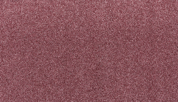 Close-up of the Noble Surface Pet Friendly Carpet in Sangria, featuring a textured, uniform surface with fine reddish-pink fibers and a stain-resistant finish.