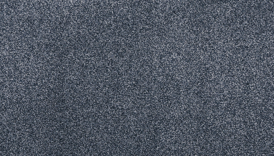 Close-up of Noble Surface Pet Friendly Carpet in Denim, featuring densely packed, stain-resistant fibers and a soft, speckled blue-grey texture.