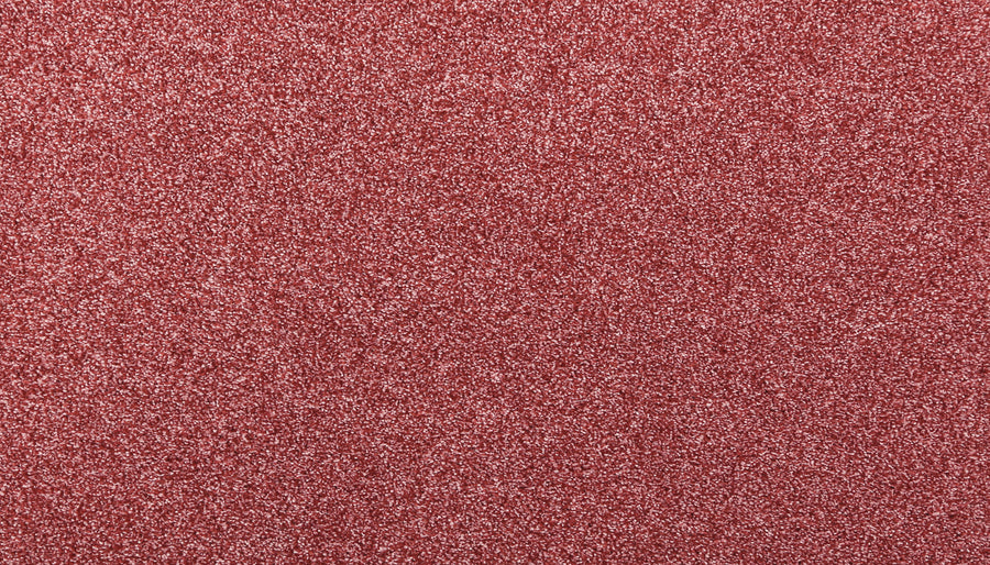 A close-up of the Noble Tone Pet Friendly Carpet in Desert Rose showcases its dense, sparkling surface, combining luxurious shine with durability for lasting appeal.
