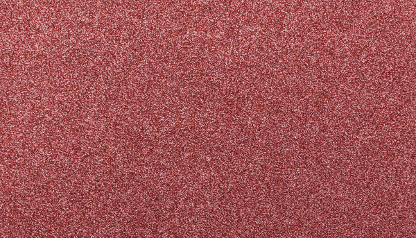 A close-up of the Noble Tone Pet Friendly Carpet in Desert Rose showcases its dense, sparkling surface, combining luxurious shine with durability for lasting appeal.