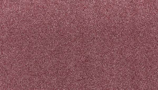 Close-up of Noble Tone Pet Friendly Carpet in Sangria, displaying its fine reddish-pink glitter texture for a sparkling look—perfect for showcasing its stain-resistant, dazzling appearance that's also pet friendly.