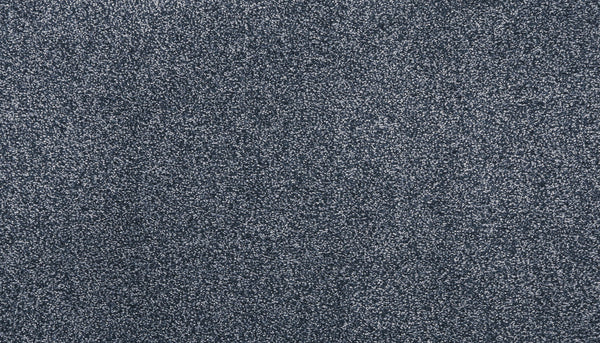 Close-up view of Noble Tone Pet Friendly Carpet in Denim, showcasing a textured stain-resistant surface with blended light and dark specks—ideal for stylish, durable homes.