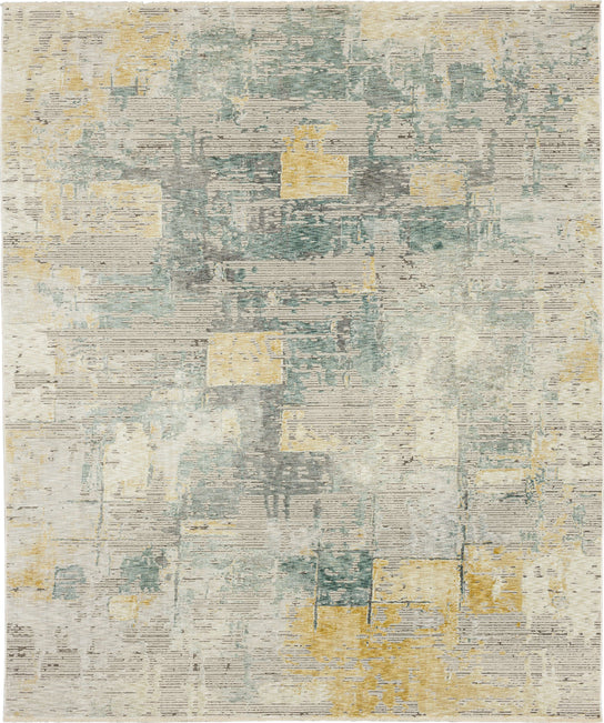 Part of the Momento Collection, the Momento Nostalgic Area Rug showcases a distressed design with blocks of muted yellow, aqua blue, gray, and cream on beige, highlighted by random geometric shapes for a textured, modern look.
