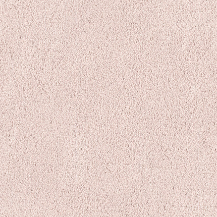 Close-up of Tribute Family Friendly Carpet in Nuance color, featuring a soft, textured, stain-resistant surface. Tightly packed fibers create a uniform look that's durable and ideal for families.