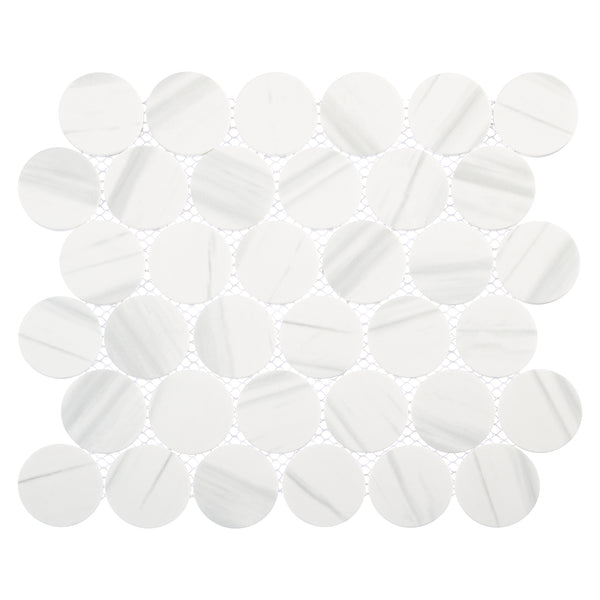 The Orbesque Round Glass Mosaic Tile in Planium features white circular glass tiles with subtle gray veining, arranged in an orbital pattern on a white mesh backing.