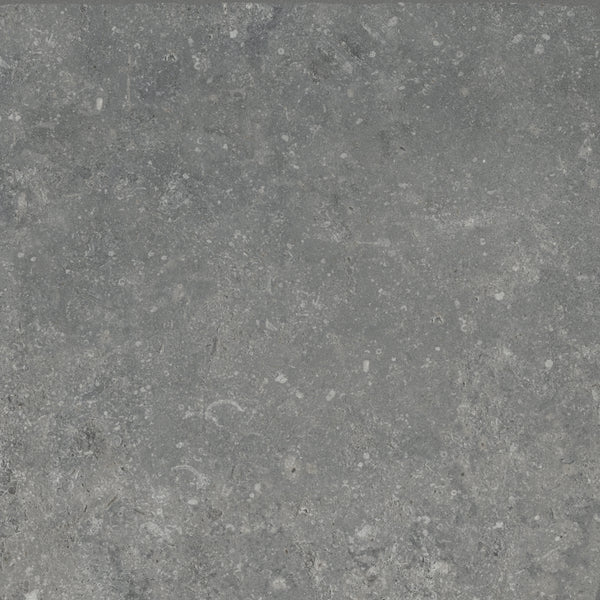 A close-up of VersaTILE 8x8 Glazed Porcelain Tile in Pyreneese Summit, showcasing its gray textured surface with subtle white speckles and natural stone-like patterns.