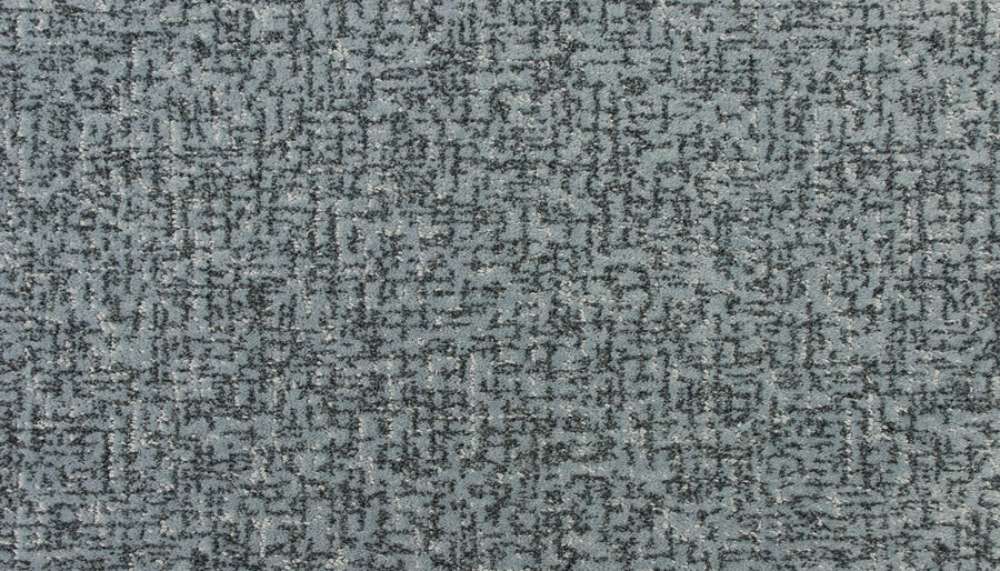 The Latticework On Trend Carpet showcases a geometric grid pattern in varied gray tones, offering a modern and textured look.