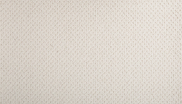 Close-up of the Flourishing Loops Family Friendly Carpet in light beige, featuring a soft, refined texture with even, clean, and uniform loops that showcase its elegant and welcoming design.