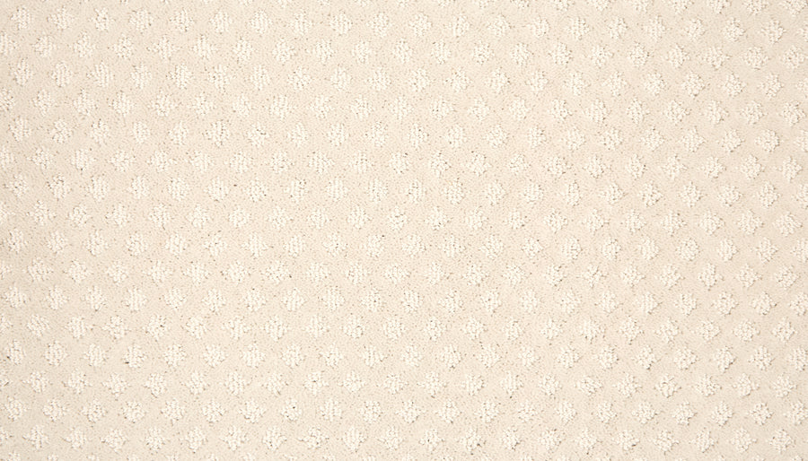 Retro Revival Pet Friendly Carpet features beige fabric with a subtle, repeating textured pattern of small, raised diamonds—combining durability and style for a pet-friendly home.