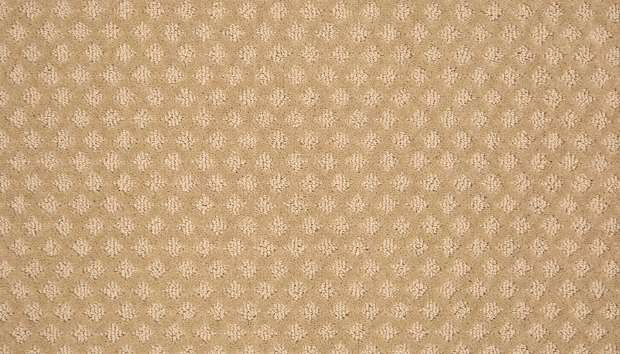 Retro Revival Pet Friendly Carpet in beige features a repeating small oval or leaf-shaped pattern, offering a textured and uniform luxury look.