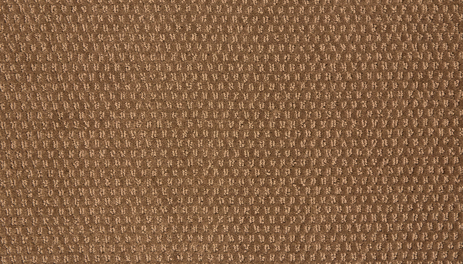 Close-up of Vintage Manner Pet Friendly Carpet shows a textured brown fabric with a small grid or waffle pattern, offering a soft, cozy, and slightly raised surface—ideal for upholstery or pet-friendly spaces.
