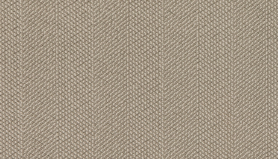 Close-up of Motley On Trend Carpet in beige, featuring a subtle diagonal herringbone pattern that highlights its detailed texture—ideal for anyone seeking a premium quality, stylish carpet.