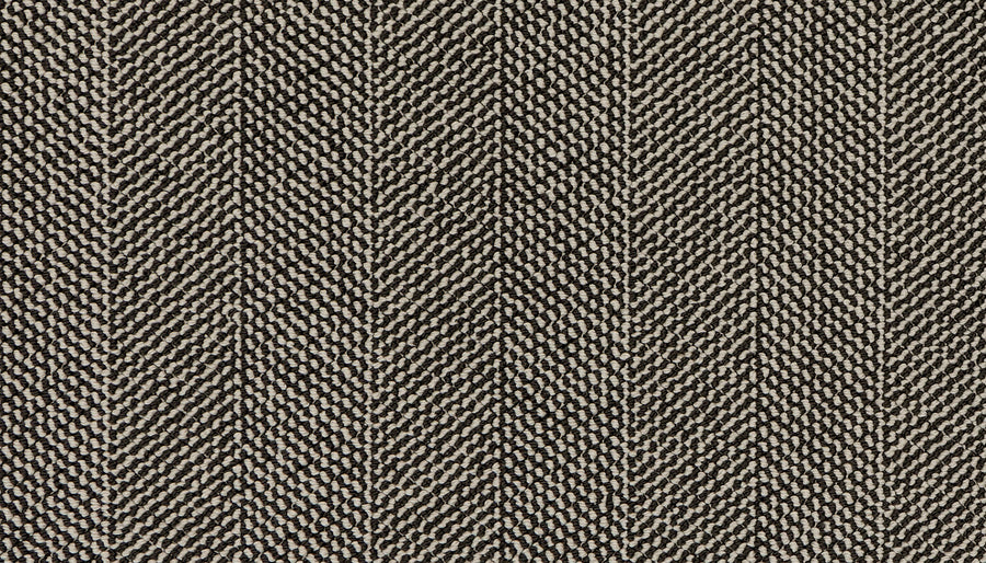 Close-up of the Motley On Trend Carpet, featuring a beige and brown herringbone pattern with striking diagonal lines—a stylish, luxurious choice for sophisticated interiors.