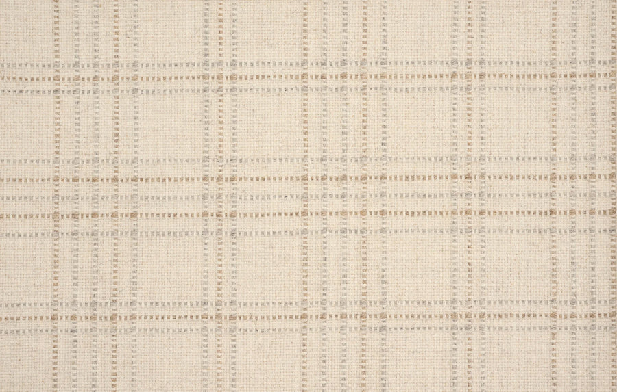 Close-up of Pristine Plaid Berber Carpet in Oat color, showcasing a soft, slightly textured surface with subtle plaid pattern in light brown and gray tones—combining sophisticated style with durable performance for home interiors.