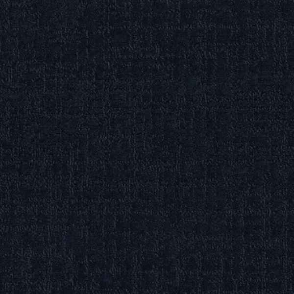 A close-up of Bangladesh On Trend Carpet in Ocean shows a dark, textured fabric with a subtle woven pattern. Its soft material and slight weave variations create a faint checkerboard effect, evoking the look of luxury carpeting.