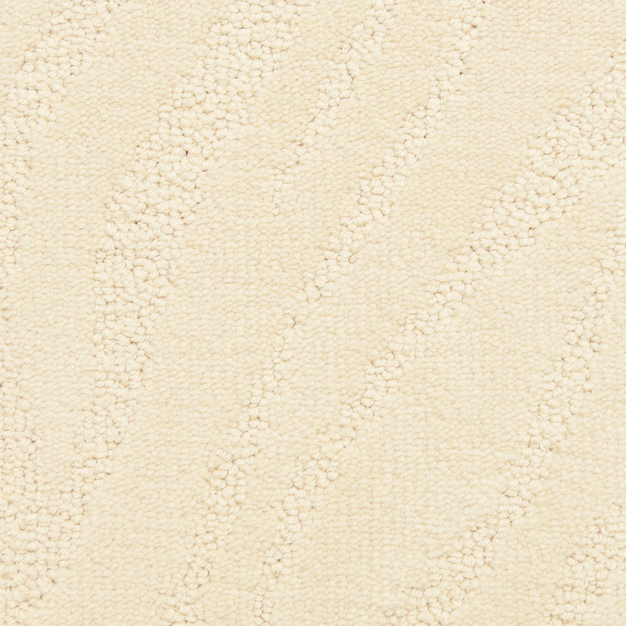 Close-up of Capetown On Trend Carpet in Old Town Hall color, featuring a cream tone with a subtle wavy diagonal pattern from raised and looped fibers. Its soft, uniform texture and gentle variations suit high-traffic areas.