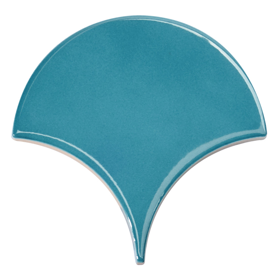 The Tidal 2x5 Ceramic Tile features a teal, fan-shaped design with smooth edges and a glossy finish—an elegant ceramic tile ideal for statement looks.