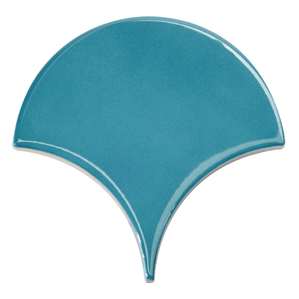 The Tidal 2x5 Ceramic Tile features a teal, fan-shaped design with smooth edges and a glossy finish—an elegant ceramic tile ideal for statement looks.