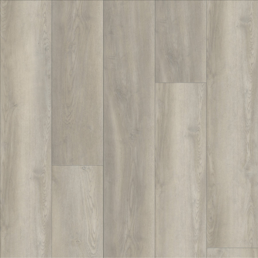 Coretec Plus Premium Vinyl features light gray panels with subtle wood grain patterns and natural knots, arranged in a staggered layout. Its smooth, matte finish offers modern style and durable flooring performance.