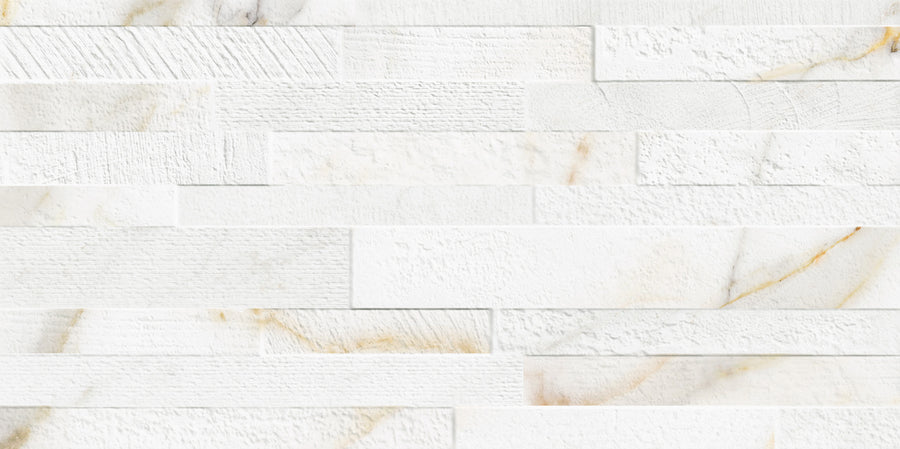 White textured stone wall with Mykonos 12x24 3D Tile in a staggered pattern. Subtle marble-like veining and a glazed finish add elegance and depth, making it ideal for refined interiors.