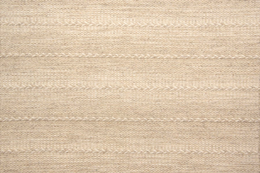 A close-up of Orzola On Trend Carpet in beige, featuring subtle horizontal stripes and a braided pattern that showcases its textured weave and natural color variations—ideal for modern interiors and contemporary design schemes.
