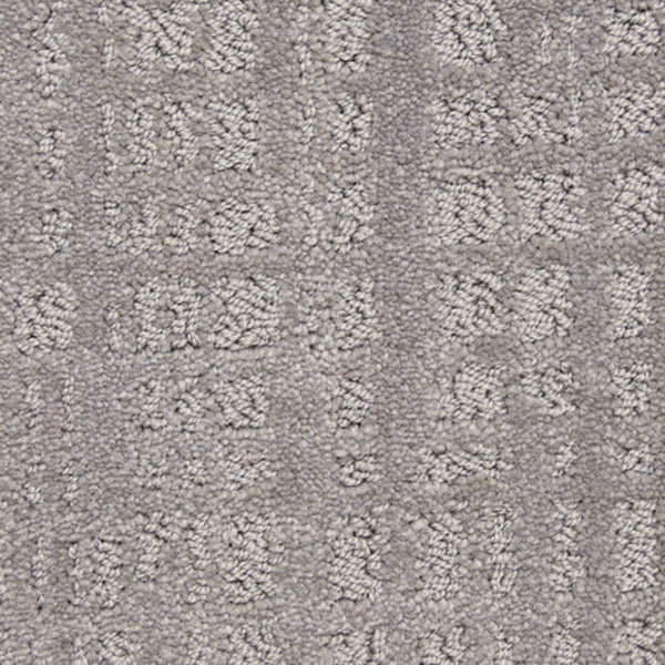Close-up of Willow Lake On Trend Carpet in Outerbanks, featuring a textured light gray surface with a subtle geometric pattern—perfect for high-traffic areas.