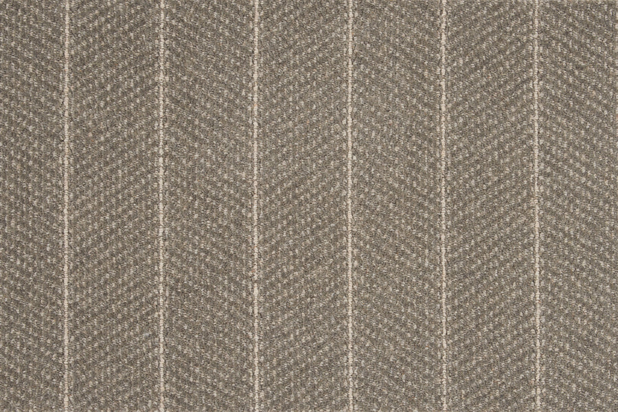 Close-up of Pacific Stripe On Trend Carpet in Gray Stone, featuring a brownish-grey fabric with subtle herringbone pattern and evenly spaced white pinstripes—ideal for modern interiors seeking a refined, contemporary look.