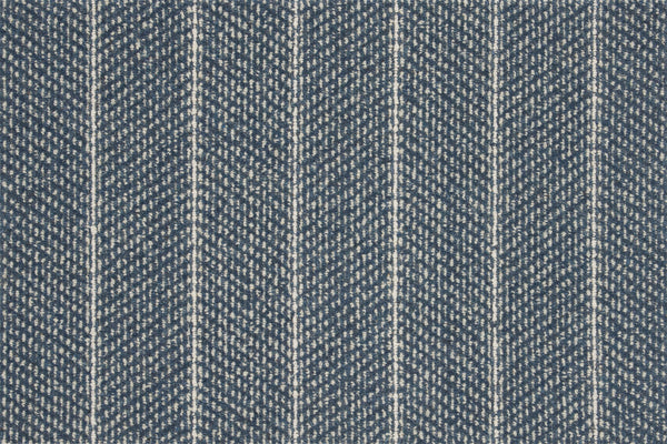 Close-up of blue denim fabric with a white herringbone pattern, echoing the zigzag and vertical stripe design of the Pacific Stripe On Trend Carpet in Marina color.