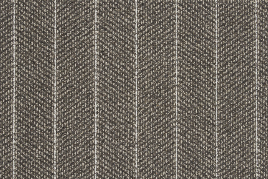 Close-up of Pacific Stripe On Trend Carpet in Shadow, showcasing a contemporary herringbone pattern in brown and beige with evenly spaced white vertical pinstripes.