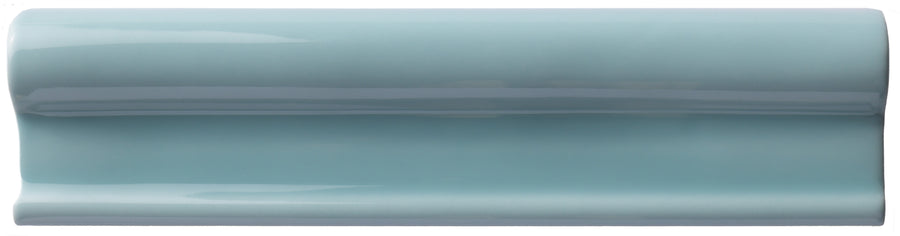The Zephyr 2x8 Rail Molding Ceramic Tile features a glossy, light blue Mediterranean look with a raised, rounded surface and smooth finish, shown against a white background for an artisanal touch.