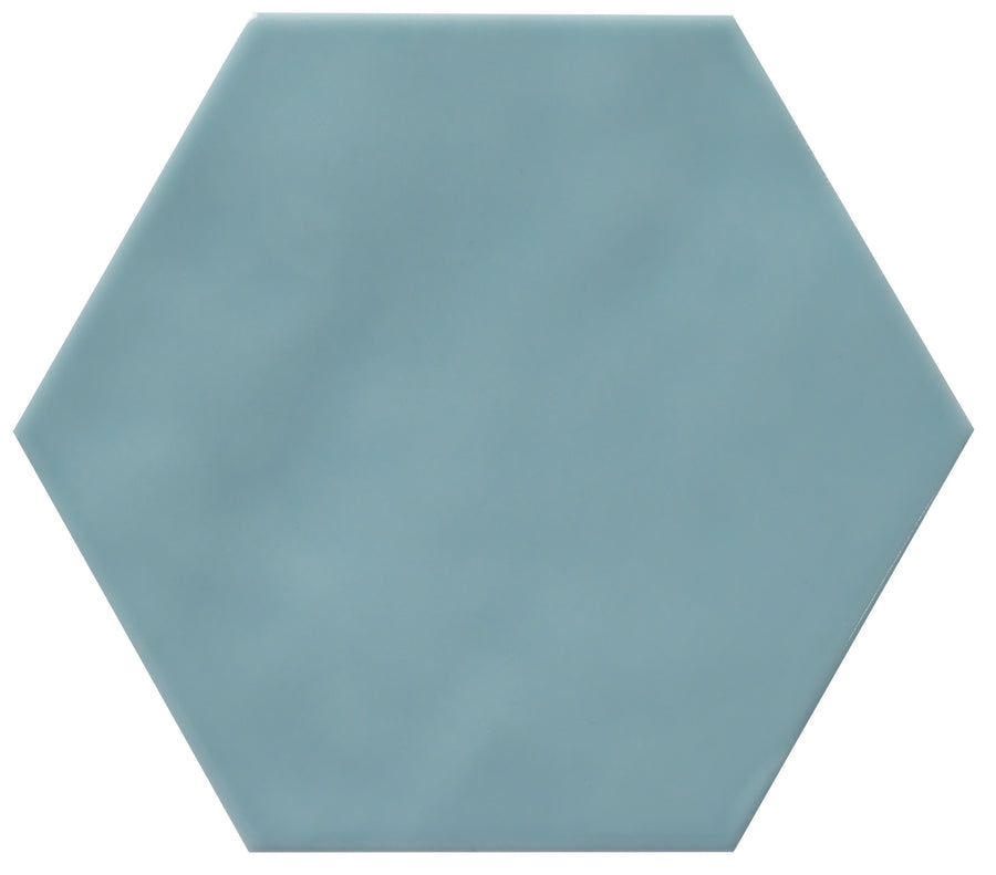 The Zephyr 4.2x4.9 Hexagon Ceramic Tile features a smooth, matte light blue Mediterranean finish, shown from above against a white background. This special-order tile adds a distinctive touch to any space.