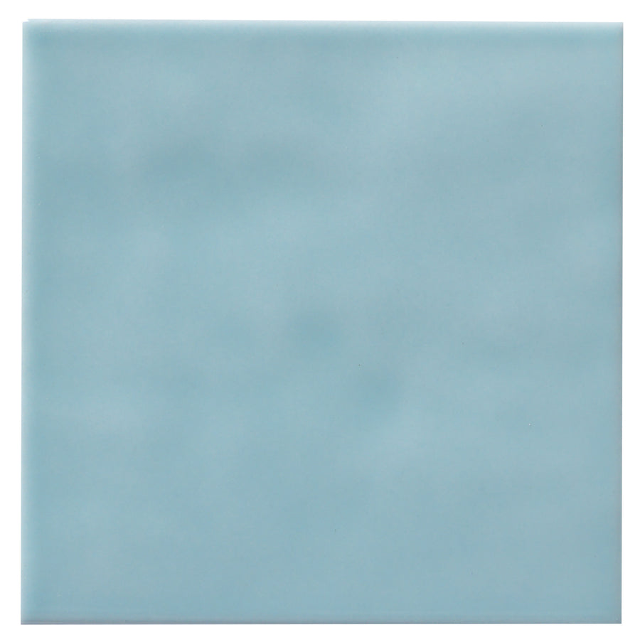 The Zephyr 4x4 Ceramic Tile is a smooth, square Mediterranean tile in solid light blue with a subtle gradient, shown from above on a white background.