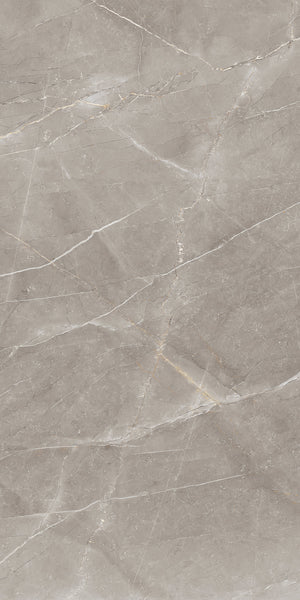 Gray marble surface with subtle white and beige veining and natural cracks running diagonally across the stone, creating a textured and elegant appearance.