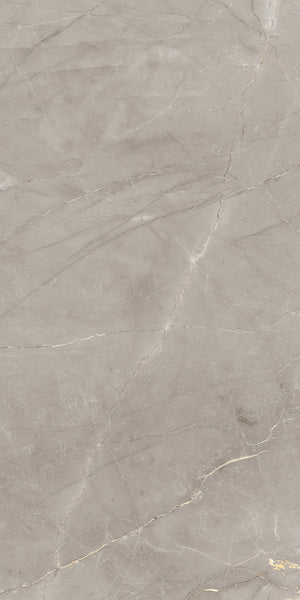 Light gray marble surface with subtle white and beige veining and natural, irregular cracks running across the stone, creating an elegant, textured pattern.