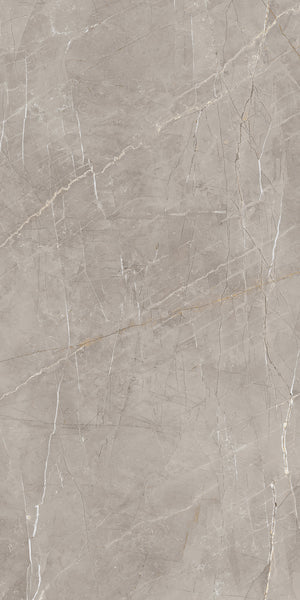 Beige marble surface with natural white and light brown veining, featuring a smooth texture and subtle variations in color and pattern throughout.