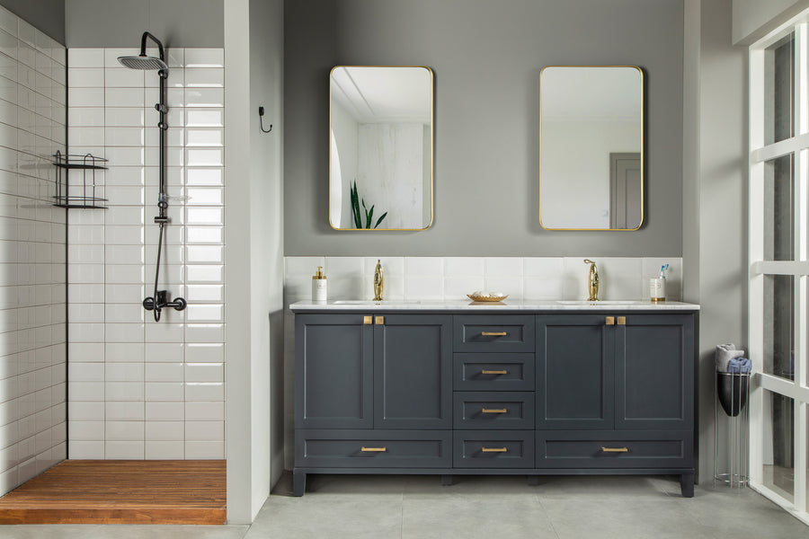 Modern bathroom with a walk-in shower, white subway tiles, wooden floor, and a Paloma 72" Double Bowl Vanity in classic style, dark cabinets, gold hardware, soft-close drawers, and two rectangular mirrors above.