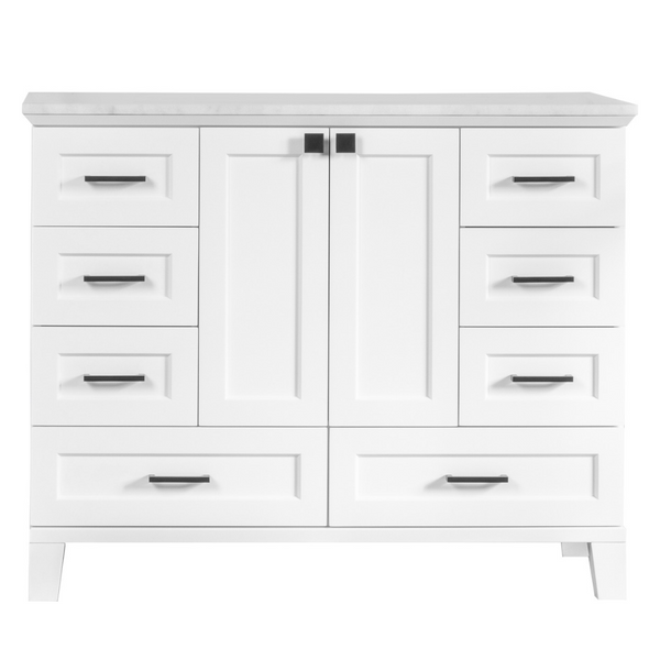 A white wooden dresser with a flat top, eight drawers featuring black handles, and two central cabinet doors, all standing on short legs.