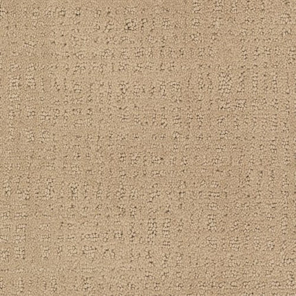 Homage Berber Carpet in Papyrus features a subtle, irregular geometric pattern with textured raised and flat areas, creating a soft surface that's ideal for high-traffic spaces.