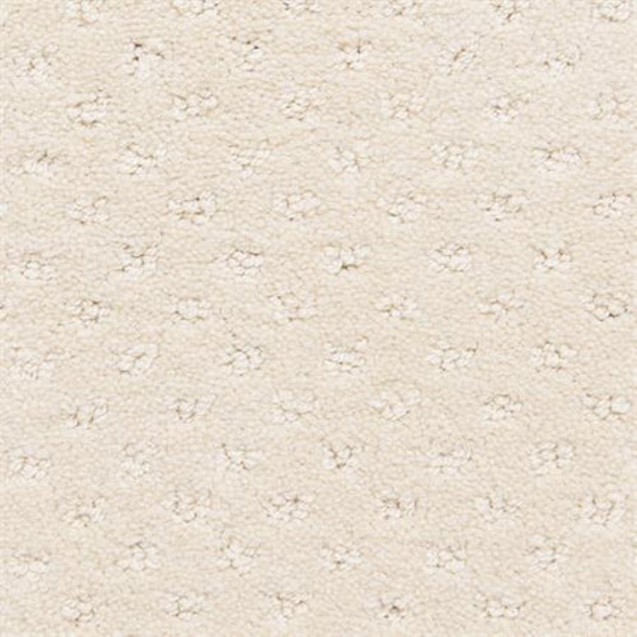 Close-up of Dreamer On Trend Carpet in Pastel: a light beige, textured surface with small, evenly spaced raised dots for a subtle pattern—perfect for luxury flooring with elegant, plush fibers.
